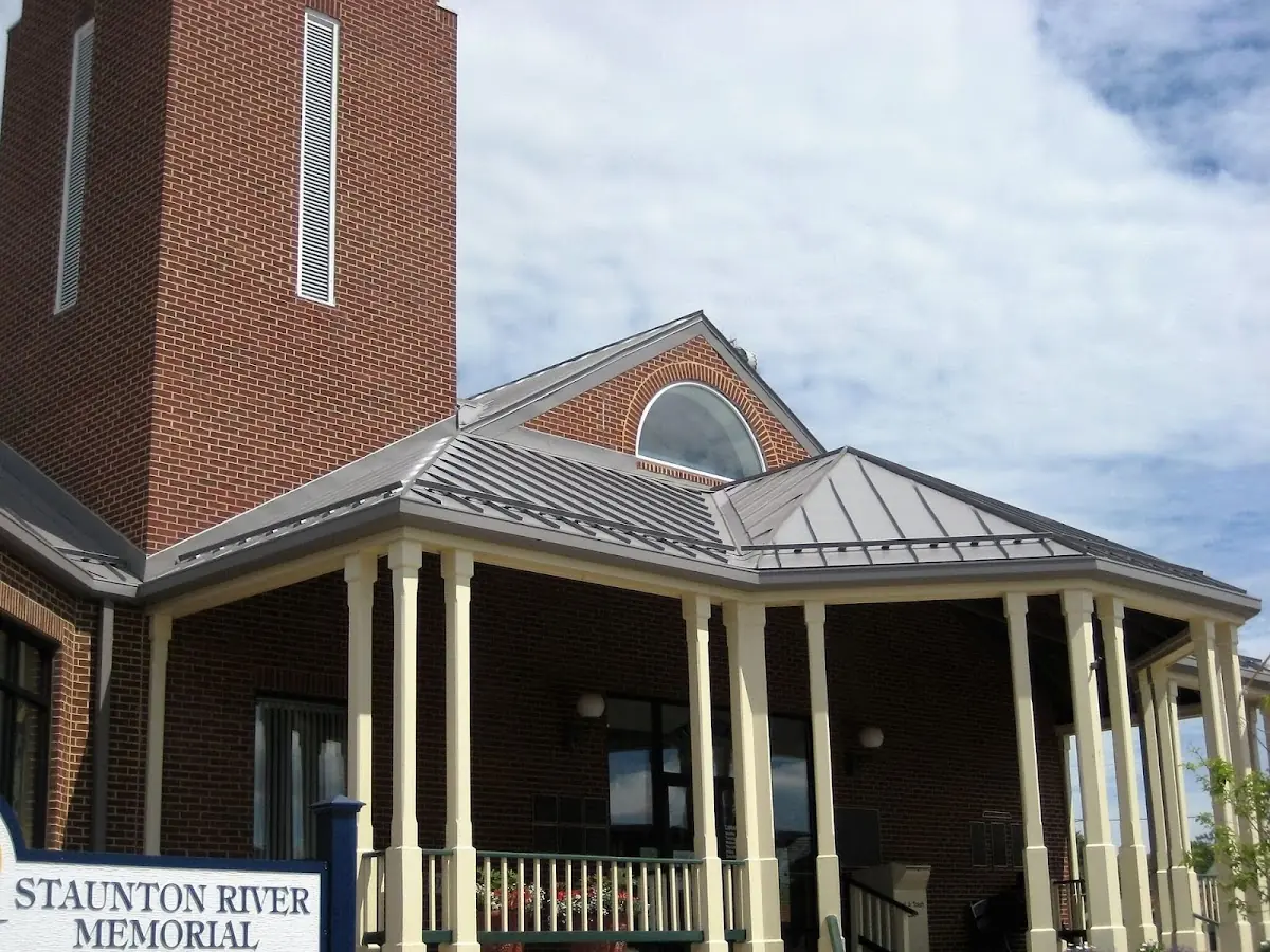Skilled roofing craftsmen working on a residential roof in Martin Luther King Jr. Area